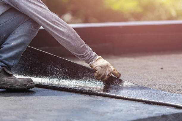 Professional Basement Waterproofing technician working in Plainview, NY